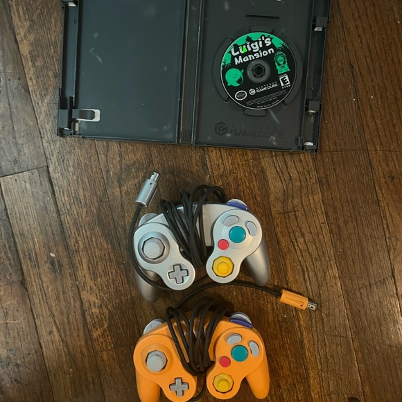 Lot of GameCube games. Controllers are included, open case games do not OG cases - Picture 3 of 4